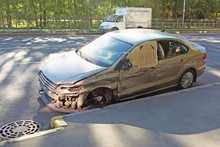 Car Without A Front Wheel After An Accident