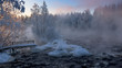 Freezing winter morning at Kuusaankoski rapids. Sun is rising. Temperature -22 °C. Finland, Laukaa