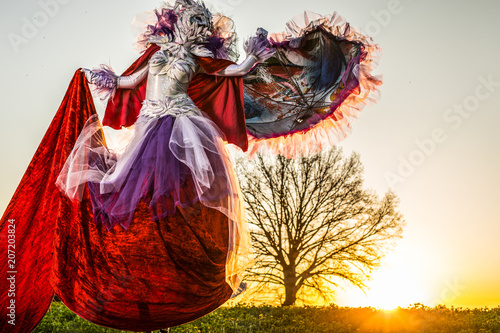Fotografia, Obraz Fairy tale woman on stilts in bright fantasy stylization