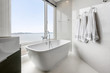 bathtub luxury marbles design with sea view of  tropical Asia hotel interior, white and clean bathroom with comfortable.