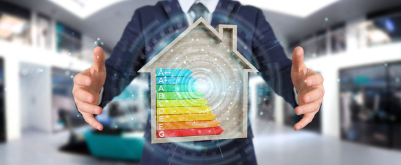 Wall Mural - businessman using 3d rendering energy rating chart in a wooden house