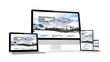 © MclittleStock - computer gadgets with responsive website on screen