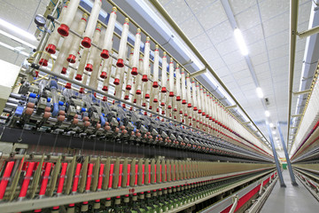 The modern spinning machine works in the workshop