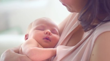 happy mother and her newborn baby. slow motion. 3840x2160 4k uhd video footage