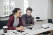 © LStockStudio - Man and Woman Working Together in Office