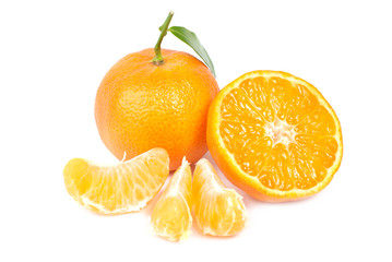 Wall Mural - Orange mandarins with green leaf isolated on white background