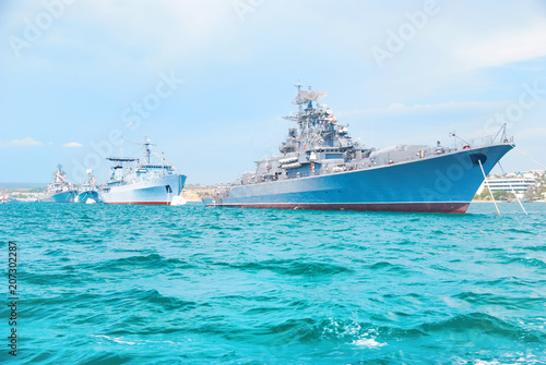 Fotografia Military navy ship in blue sea with sky and clouds