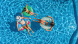 © Iuliia Sokolovska - Aerial top view of family in swimming pool from above, happy mother and kids swim on inflatable ring donuts and have fun in water on family vacation, tropical holidays on resort