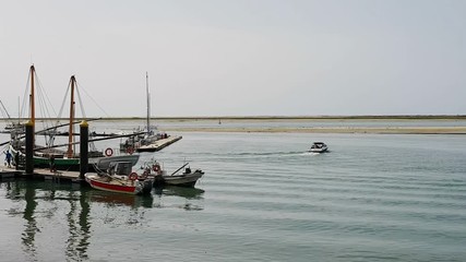 Canvas Print - Yacht and boat on the dock in the city of Olhao. Ria Formosa