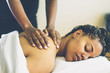 © Gerald Carter/Creative Flame - Woman receiving back massage at spa