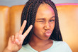 © Gerald Carter/Creative Flame - Close up of teenage girl making funny faces