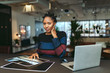 © Gerald Carter/Creative Flame - Portrait of young businesswoman sitting in the office