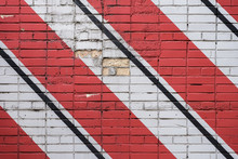 Diagonally Painted Bricks Surface Of Wall In Red, Black And White Colors, As Graffiti. Graphic Grunge Texture Of Wall. Abstract Geometric Modern Background
