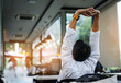 © Love You Stock - The back of a businessman stretch oneself. Spend time in a relaxed and stress-free cafe and relax.