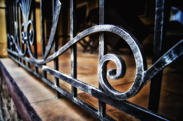 forged metal fence in retro style