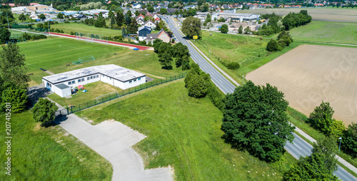 Fotografie, Tablou Aerial view of the clubhouse of a regional football club on the outskirts of the