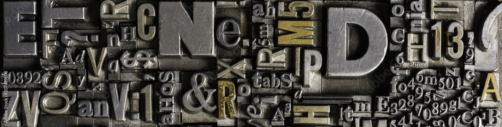 Metal Letterpress Types.
A background from many historical typography letters in black and white with white background. - obrazy, fototapety, plakaty 
