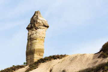 Sticker - fairy chimney rock on mountain slope in Goreme