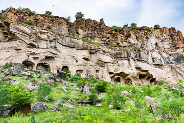 Wall Mural - carved caves in Ihlara Valley in Cappadocia