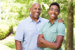 © digitalskillet1 - African American father and teen son.