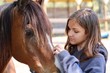 Girl Petting Horse's Face
