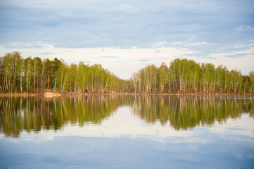 beautiful, picturesque nature. The lake is surrounded by forest.