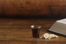 Christian Communion On A Wooden Table