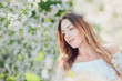 © Volodymyr Shcherbak - Close up romantic portrait of beautiful elegant woman in blossom spring trees.