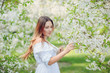 © Volodymyr Shcherbak - Close up romantic portrait of beautiful elegant woman in blossom spring trees.