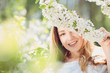 © Volodymyr Shcherbak - Close up romantic portrait of beautiful elegant woman in blossom spring trees.