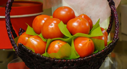 Red fresh ripe tomatoes at supermarket