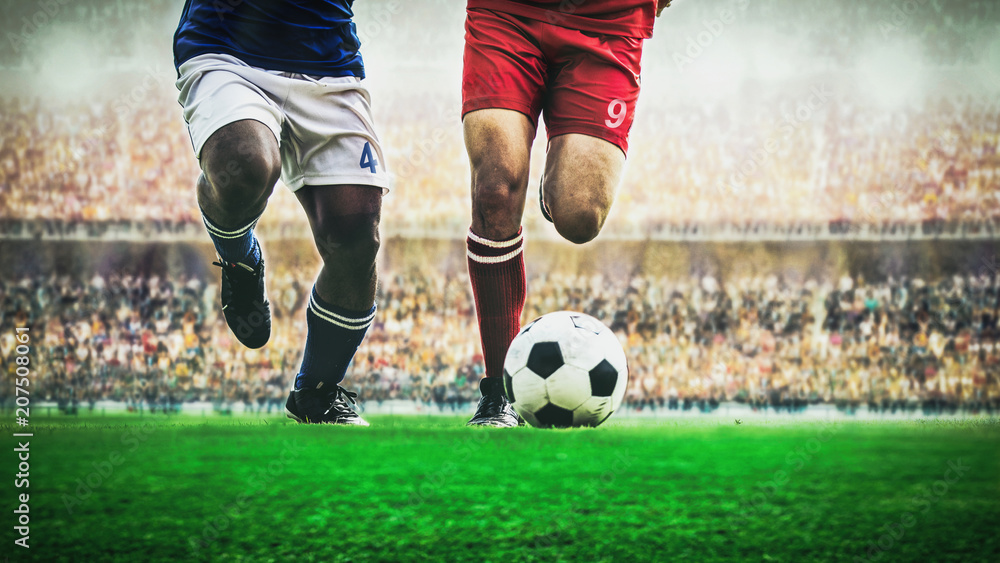 Obraz na płótnie Two soccer football player dribbling a ball during match in the stadium w salonie