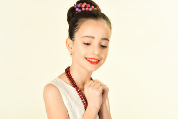 Retro girl or fashion model, beauty. Little girl in vintage dress, prom. Fashion and beauty, pinup style, childhood. Child girl in stylish glamour elegant dress. Retro look, hairdresser, makeup