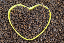 Coffee Beans Texture In Form A Heart.