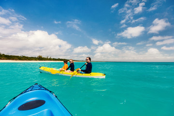 Poster - Family kayaking at tropical ocean