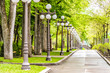 Grande Allee sidewalk with row of lantern light lamps during day with nobody in Quebec City, Canada