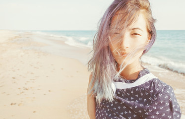 Sticker - Portrait of mixed race woman on beach.