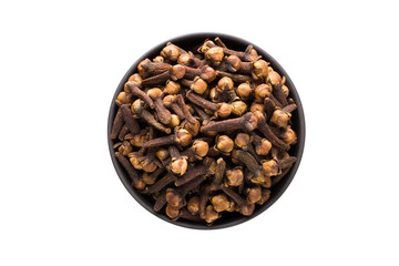 Wall Mural - dry cloves in clay bowl isolated on white background. Seasoning or spice top view