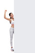 © Viorel Sima - excited gym girl with blank board celebrating