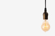 Edison light bulb on white background. space for text