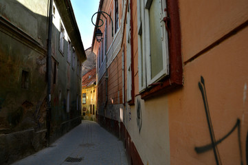 Sticker - Alecu Russo Street , unique atmosphere and amazing old colorful narrow street in the center of Brasov, beautiful city in Romania.