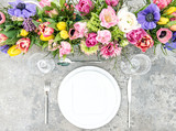 Fototapeta  - Spring flowers table place setting floral decoration