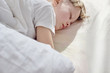 © Denys Kurbatov - Portrait of cute young boy sweetly sleeping in bed