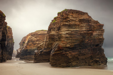 Wall Mural - Cathedrals beach with its natural rock arches, on the coast of Lugo, Spain