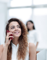 Canvas Print - closeup. business woman with a smartphone