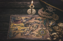 Pirate Treasure Map, Gold Nuggets And Pirate Hat On Aged Wooden Table Background. Sea Travel.