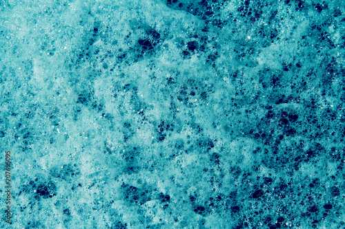 Fotografia, Obraz Close up of a lot of blue suds on water.