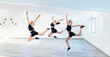 The group of beautiful girls practicing modern ballet dance.