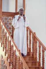 Poster - Muslims black african Imam has a speech on friday afternoon prayer in a mosque