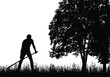 Silhouette of man mowing grass with a scythe under the tree